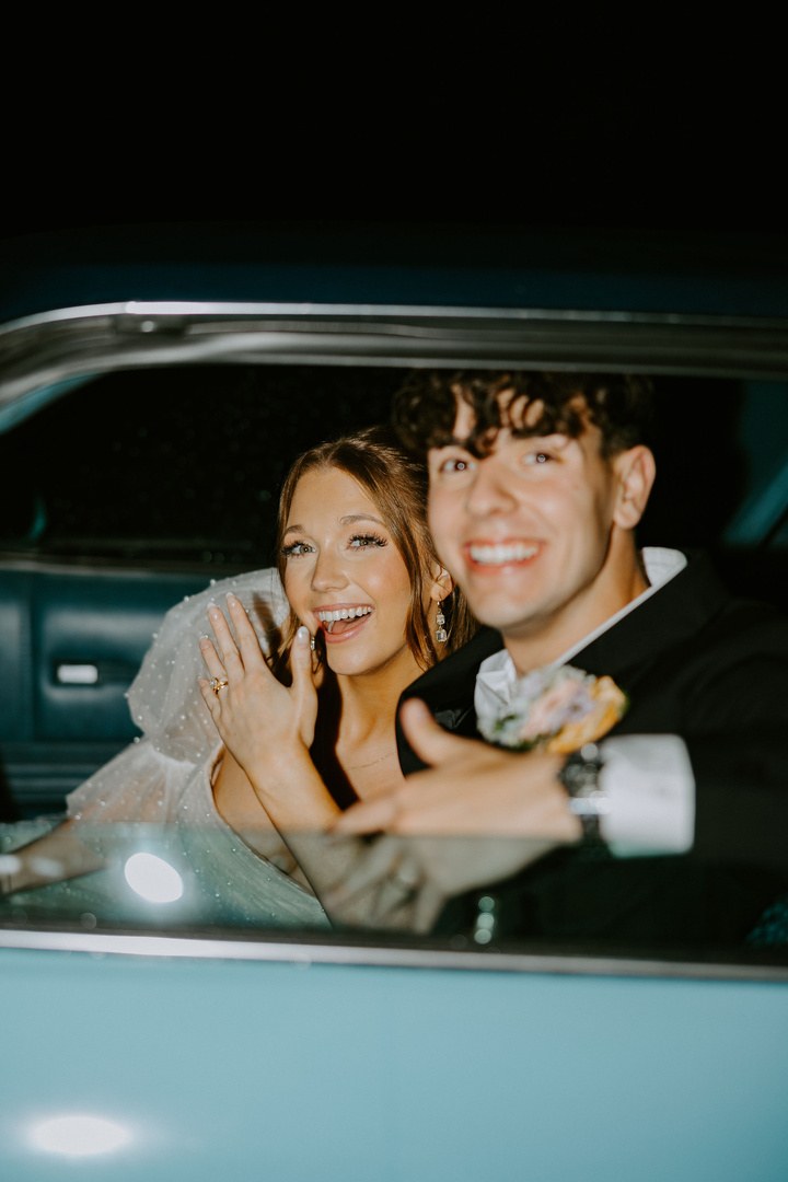 Avery and Timothy leaving their wedding in a vintage car