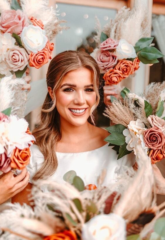Cydney in a burnt orange and pampas bridal bouquet