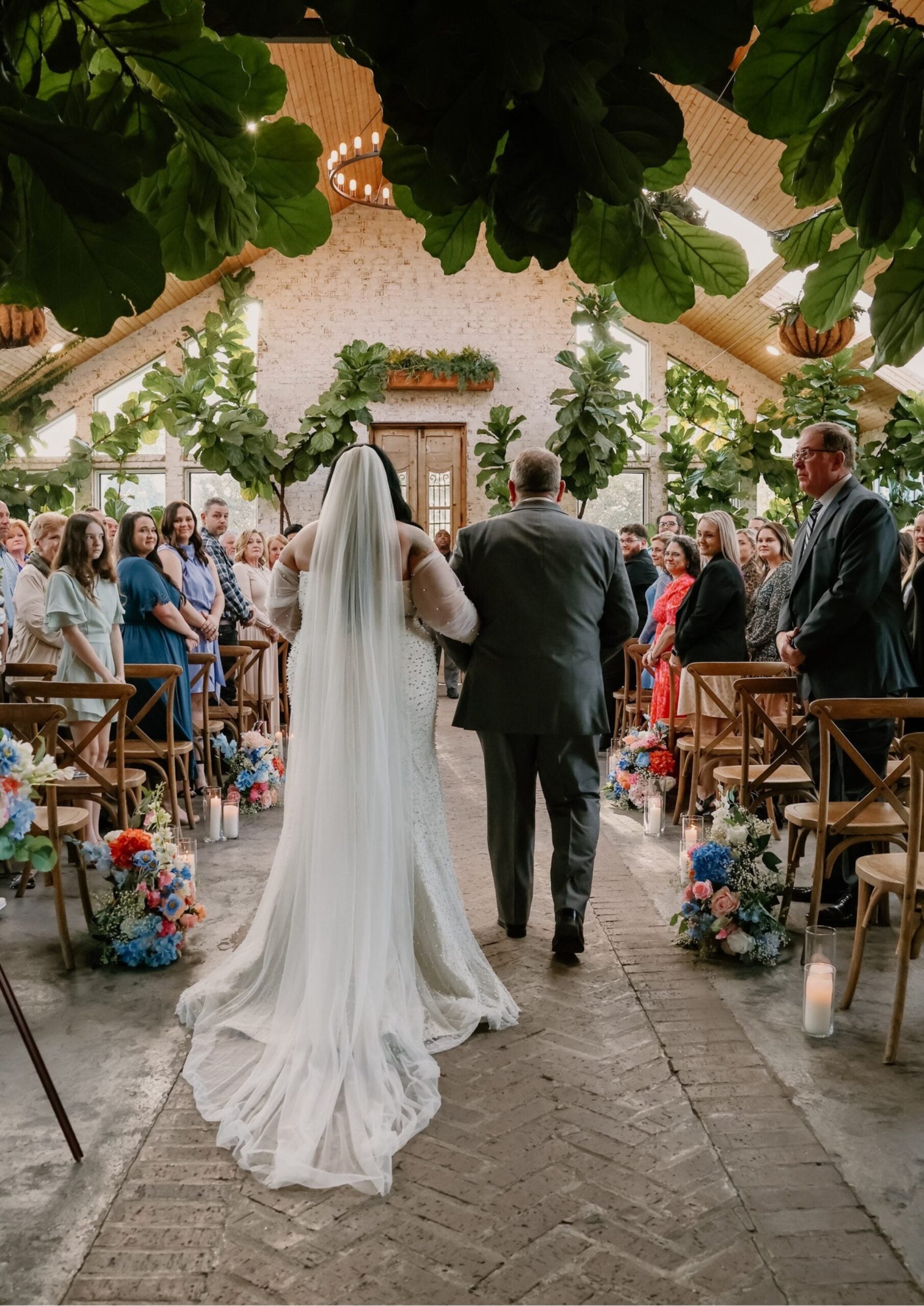 Keri walking down the aisle at The Greenery