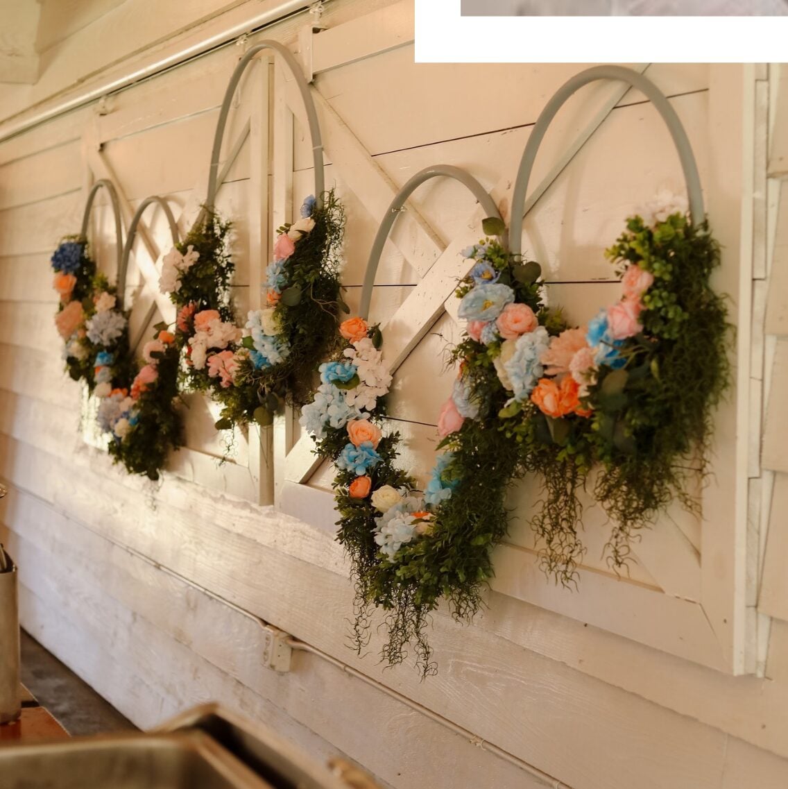Floral hoops and greenery decor at The Greenery